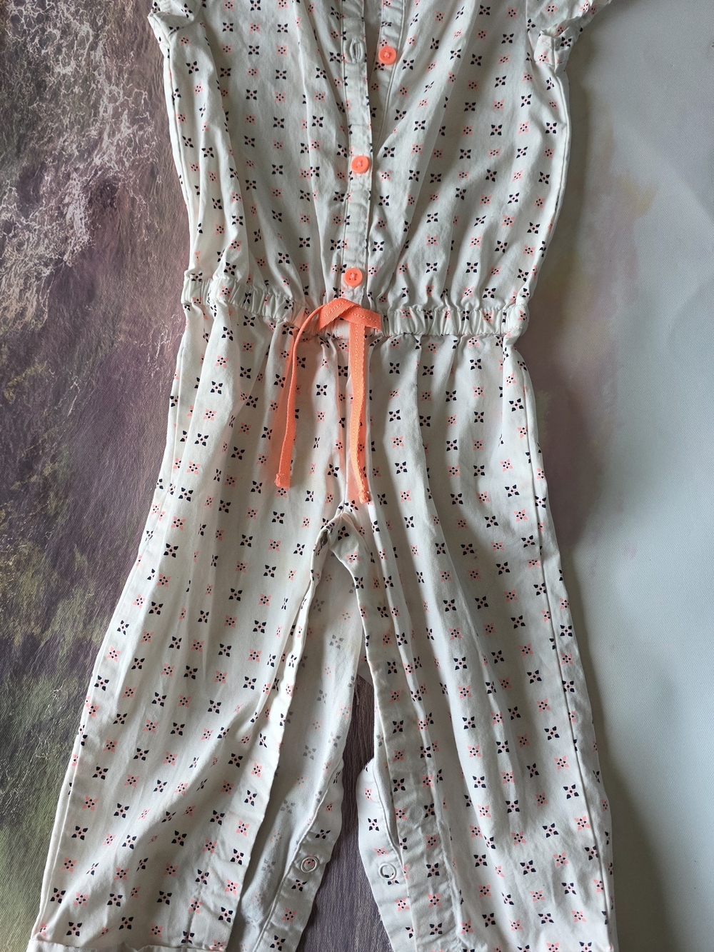 NWOT Toddler Girls Cream Printed Jumpsuit with Coral Drawstring
